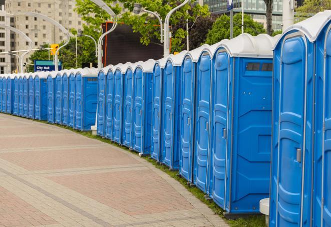 a row of portable restrooms at a fairground, offering visitors a clean and hassle-free experience in noti